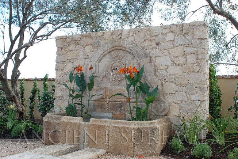 The legendary channeled coy pond and wall fountain combination. commissioned and realized by Ancient Surfaces, installed in Shady Canyon California. Has been featured extensively in many showcase home tours in orange county as well as on local and national front covers of shelter magazines across the nation.