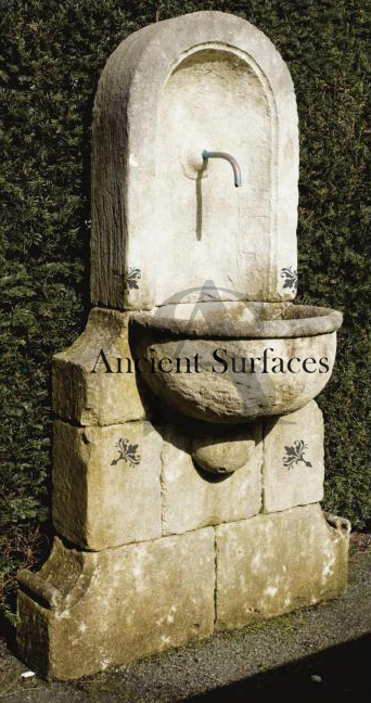 A unique antique stone wall fountain. A life long dedication to quality architectural stone products beyond belief. http://www.ancientsurfaces.com/Antique-Wall-Fountains-2.html