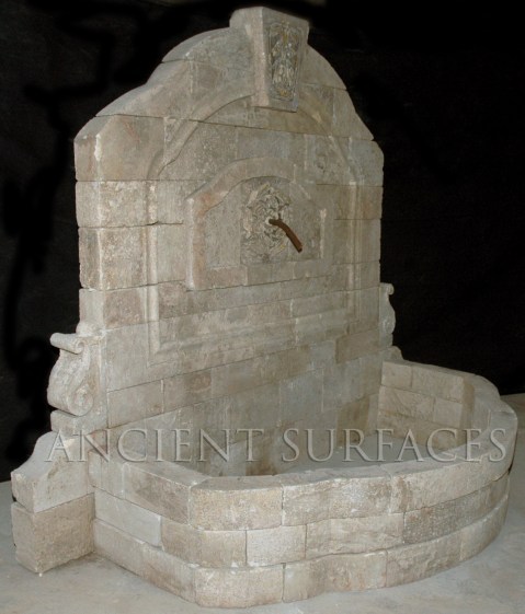 A unique antique stone wall fountain. A life long dedication to quality architectural stone products beyond belief. http://www.ancientsurfaces.com/Antique-Wall-Fountains-2.html