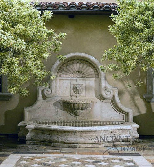 Hand Carved Limestone Classical Wall Fountain in an Exposed Open Inside Courtyard By Ancient Surfaces.