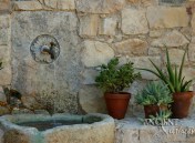 Antique Medieval wall fountain by Ancient Surfaces.