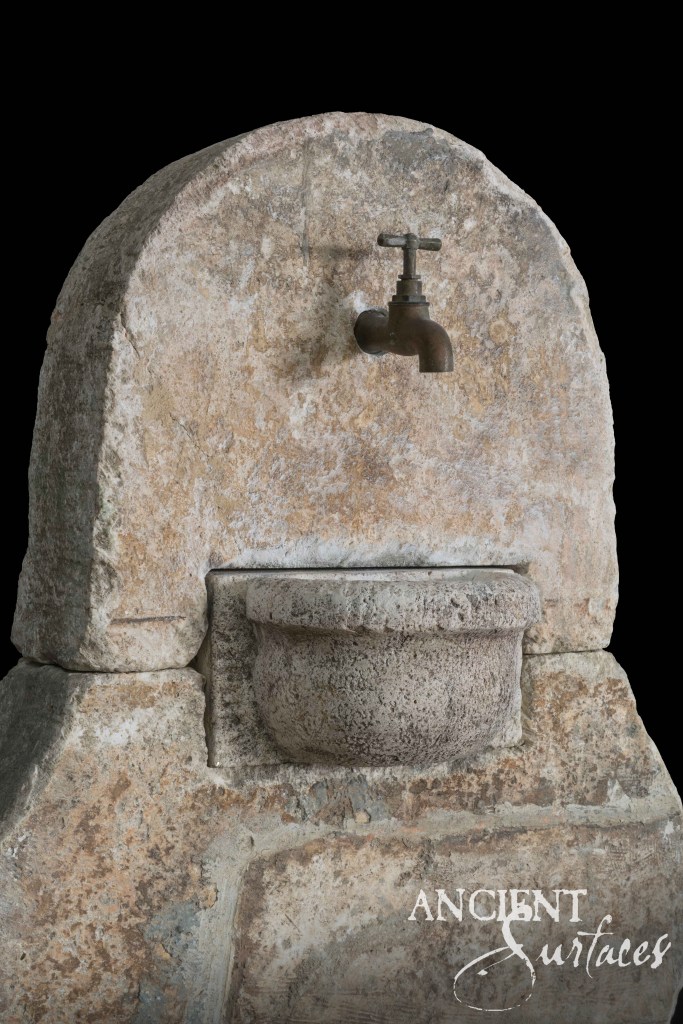 Reclaimed limestone wall fountains
Ancient Surfaces garden features
Antique stone water fountains
Limestone lion head spout fountain
Historic limestone wall basins
Patina stone fountain designs
Mediterranean reclaimed stone fountains
Baroque limestone fountain detailing
Rustic Provençal garden fountains
Romanesque limestone wall pieces
Aged limestone courtyard accents
Architectural reclaimed wall fountains
Decorative limestone outdoor water features
Timeless reclaimed limestone craftsmanship
Sustainable antique limestone design